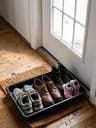 13 Front Door Shoe Organization Ideas That End the Entryway Pile